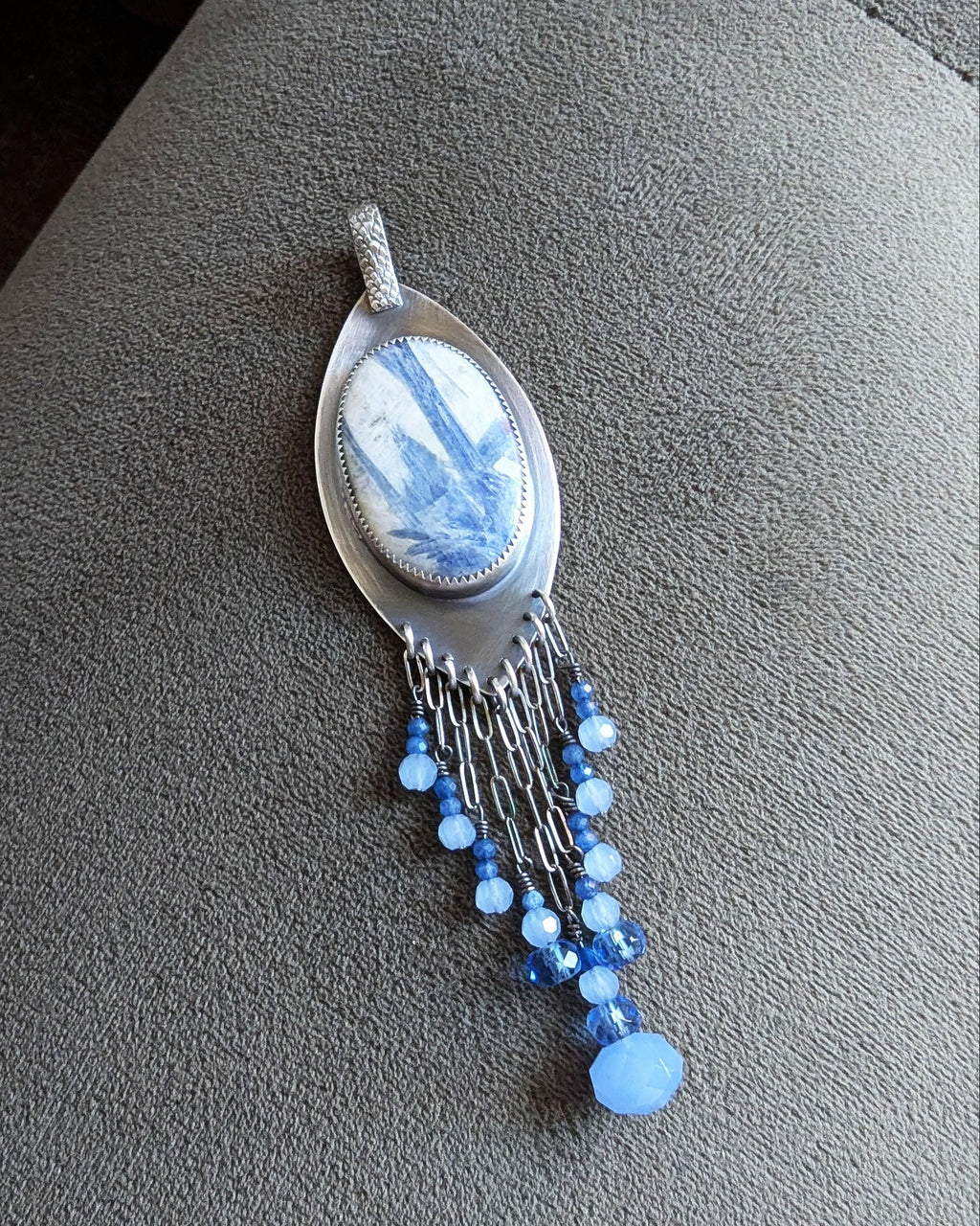 Artisan sterling silver pendant with layered blue gemstone fringe