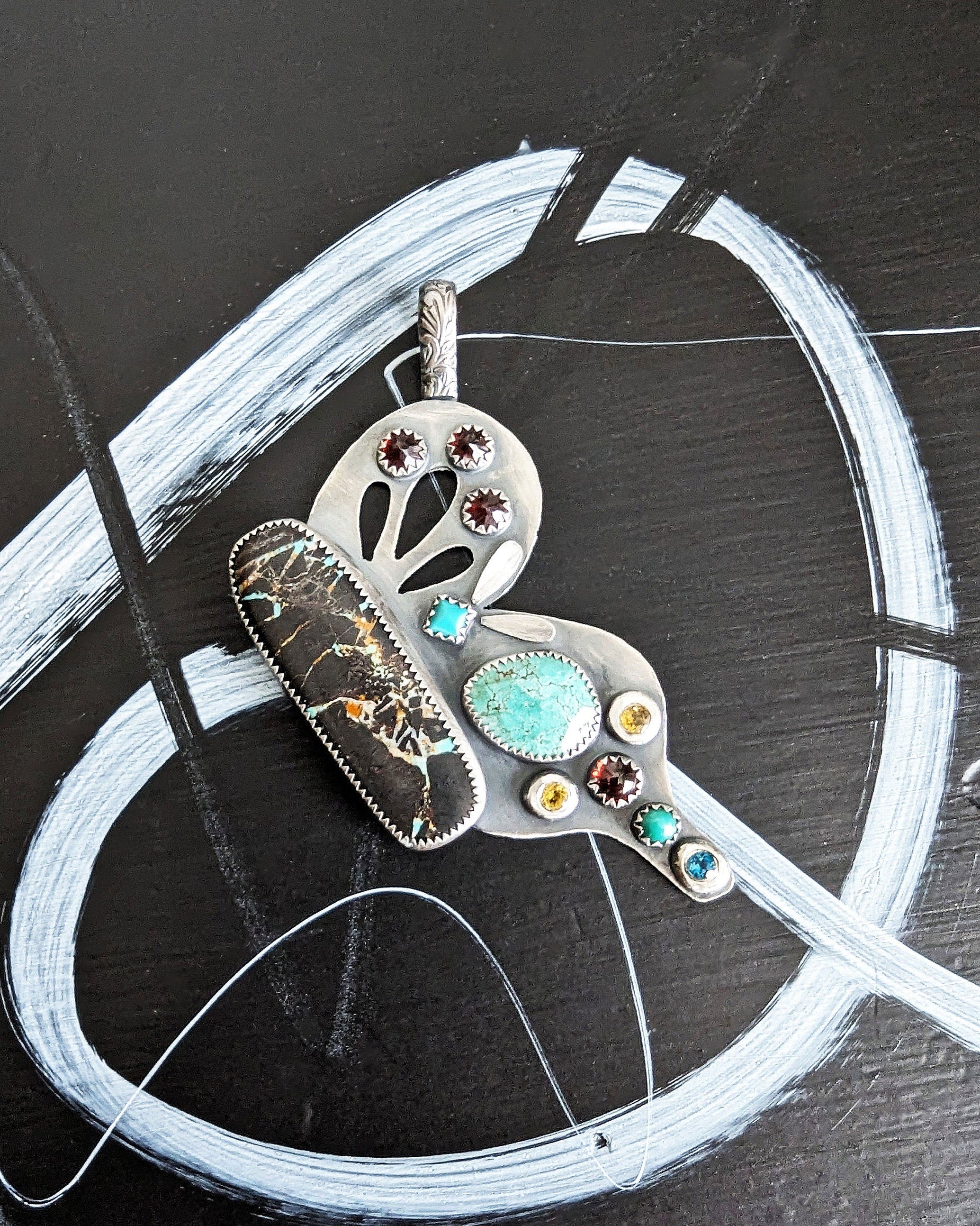 Southwestern butterfly pendant with turquoise gemstones in oxidized sterling silver
