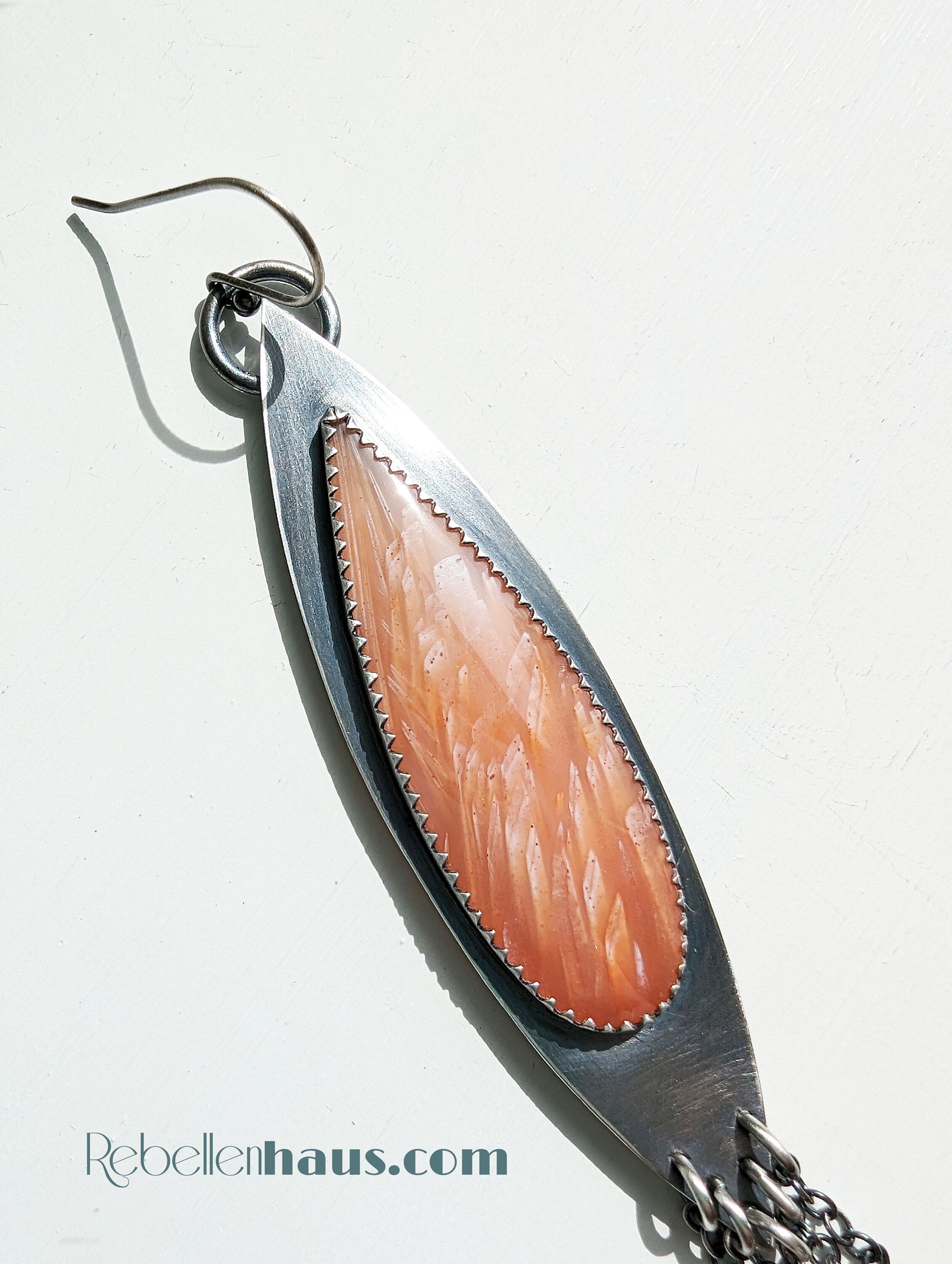Vibrant summer statement earrings in warm pink and orange tones