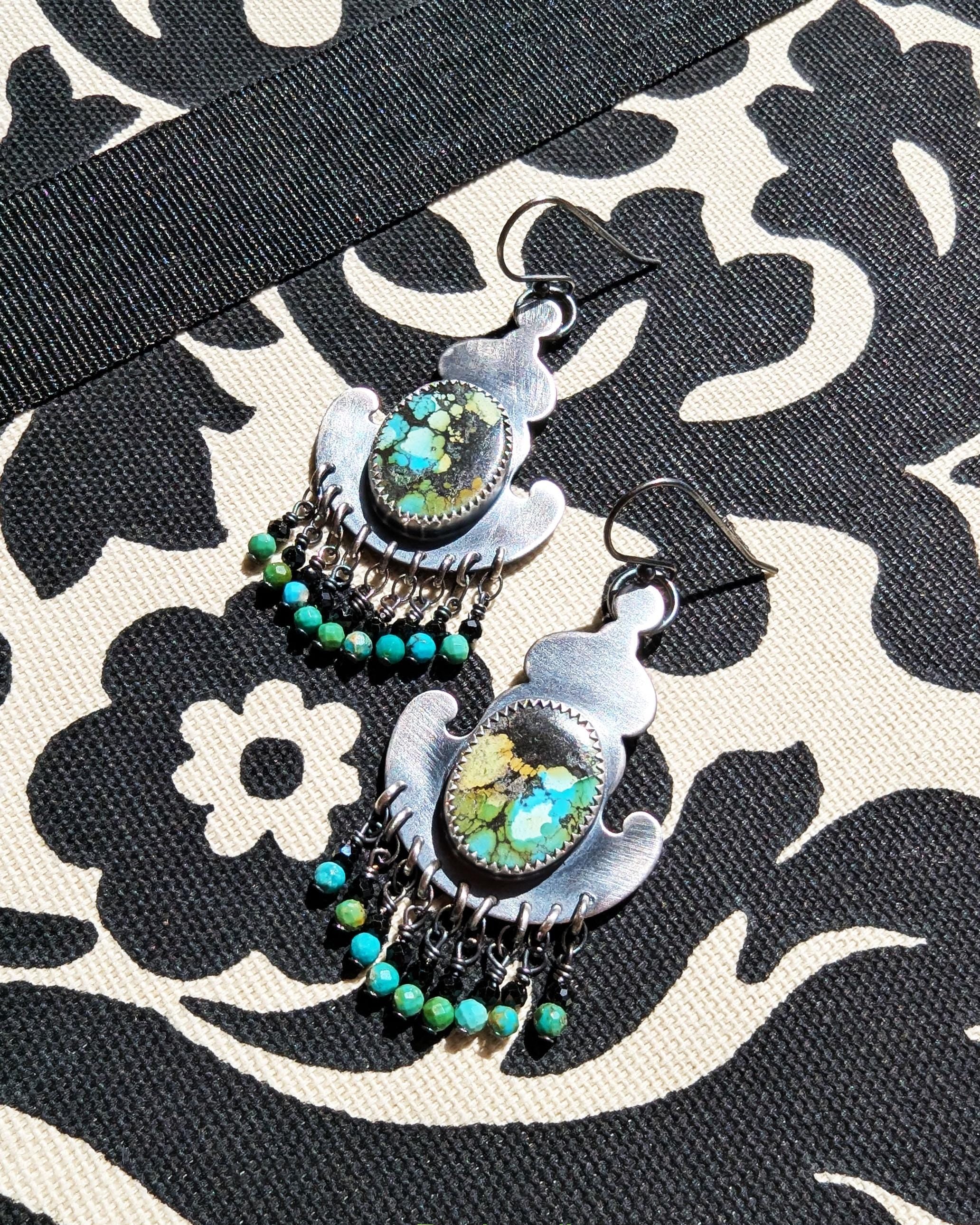 Oval turquoise dangle earrings with black matrix and chain fringe