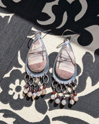 Rhyolite jasper earrings with garnet and moonstone fringe in oxidized sterling silver