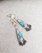 Artisan handmade opalized wood earrings with abstract turquoise patterns