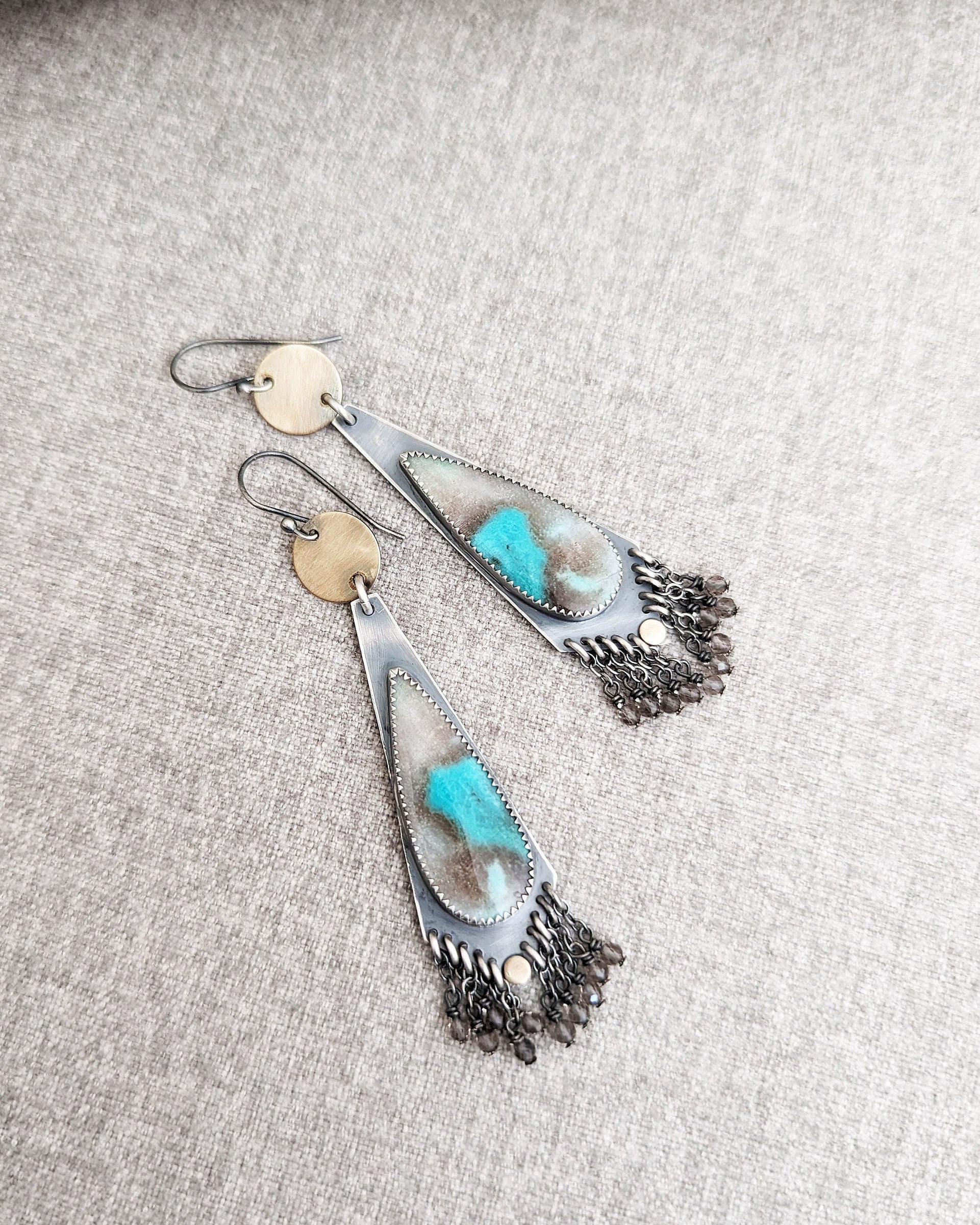 Artisan handmade opalized wood earrings with abstract turquoise patterns