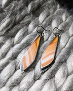 Hand-textured rivet detail on oxidized silver leaf earrings
