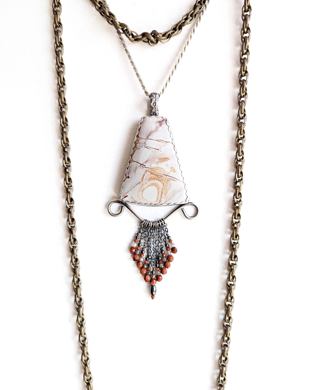 Nature-inspired sterling silver pendant for fall styling
