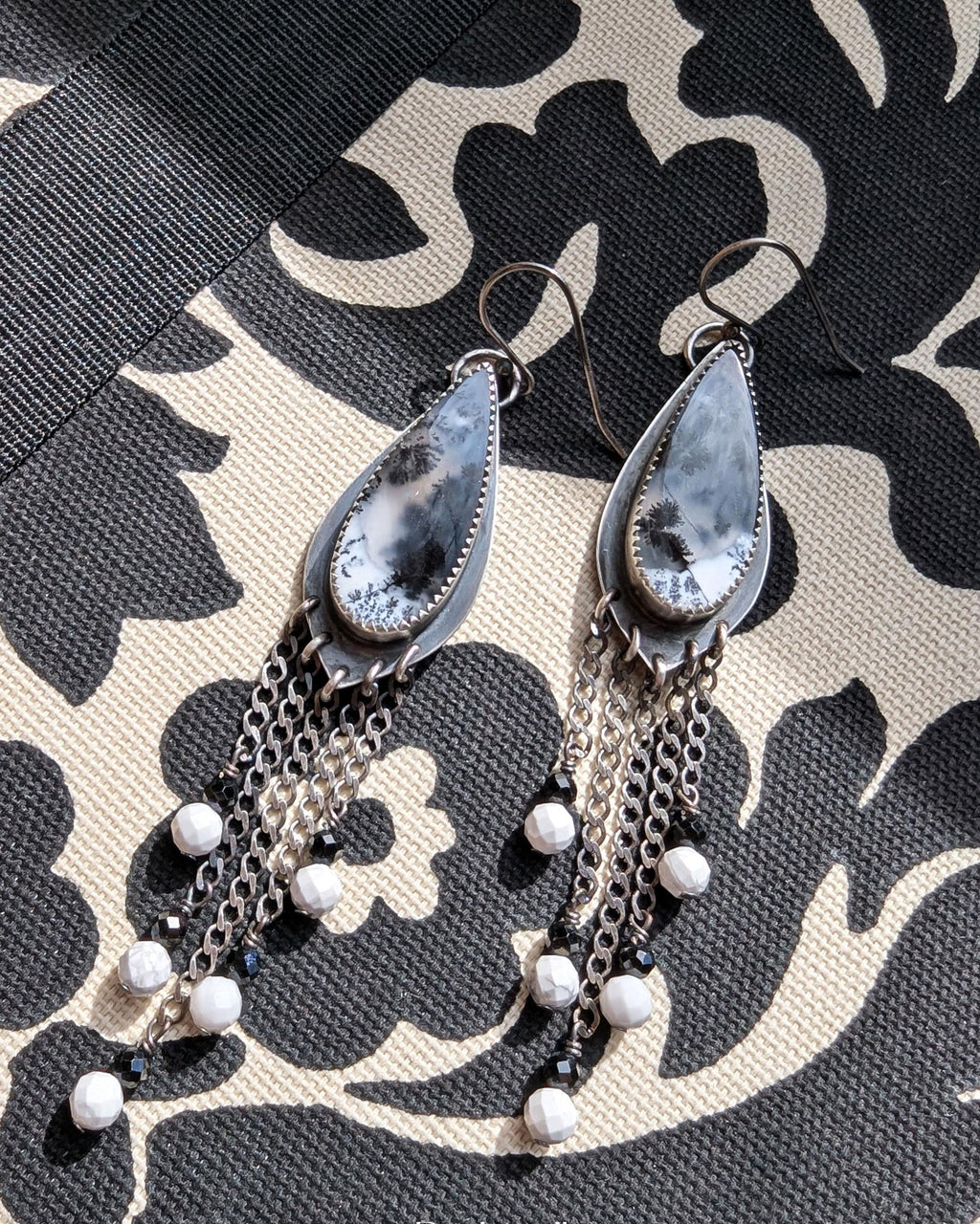 Oxidized sterling silver leaf motif earrings with graduated chain detail