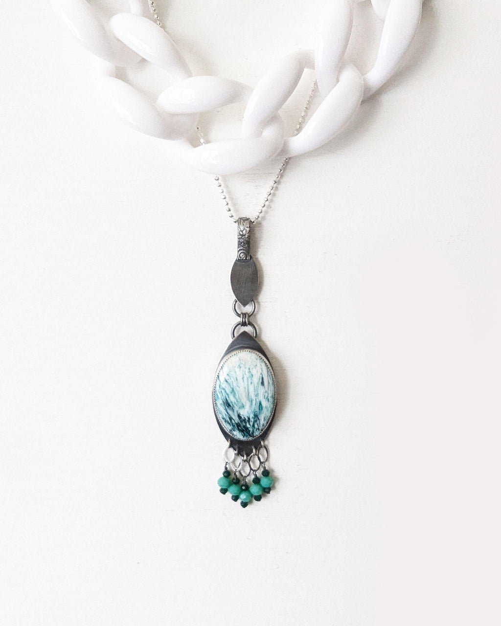 One of a kind scolecite pendant with fire polished glass bead fringe shown with layer necklace and on chain for styling