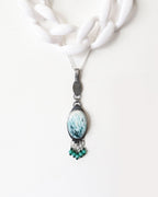 One of a kind scolecite pendant with fire polished glass bead fringe shown with layer necklace and on chain for styling