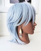 Artisan handmade agate earrings with larimar and sunstone beads on mannequin for scale