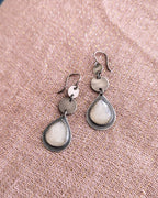 Neutral gemstone earrings with understated shimmer