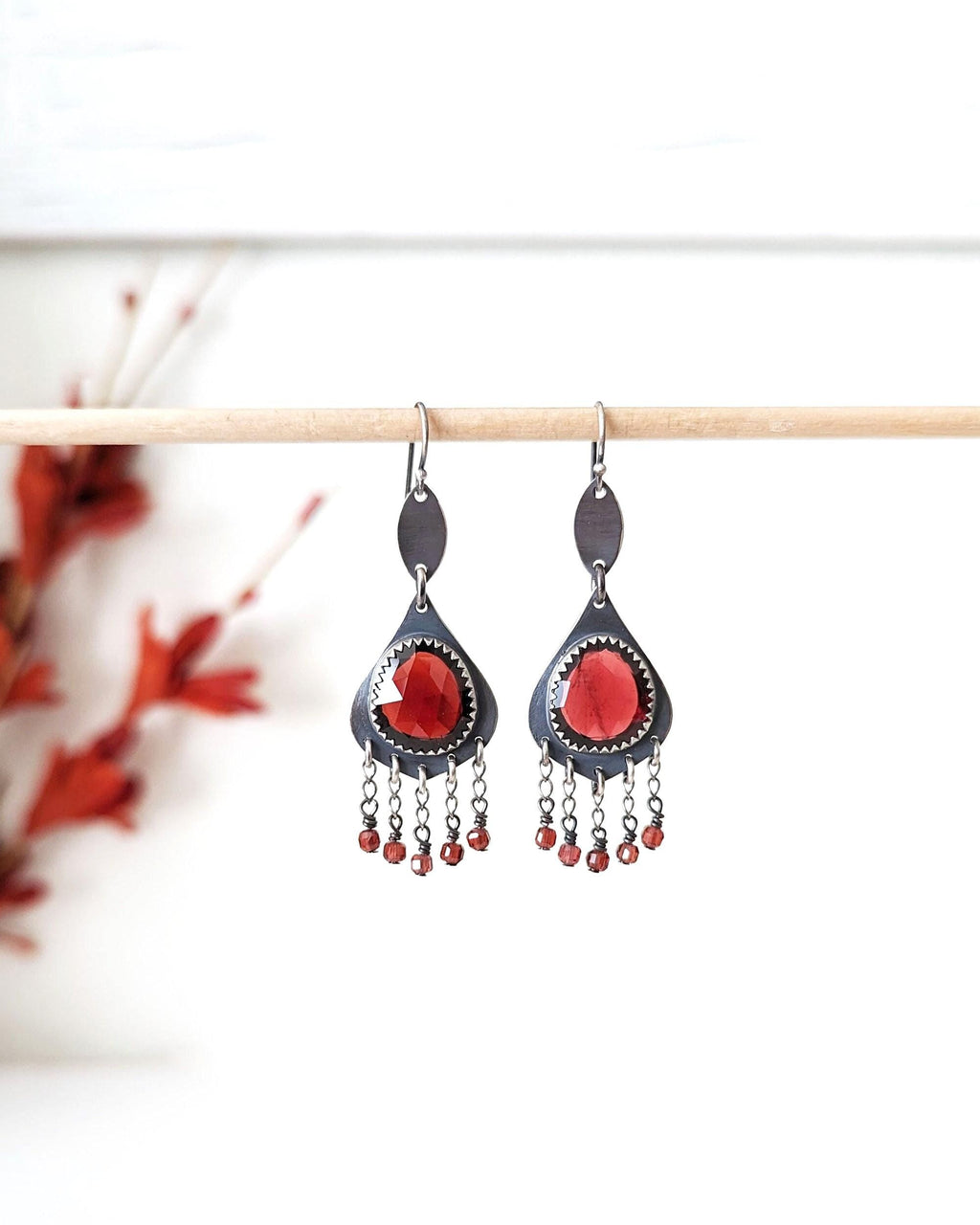 Red garnet leaf earrings in oxidized sterling silver