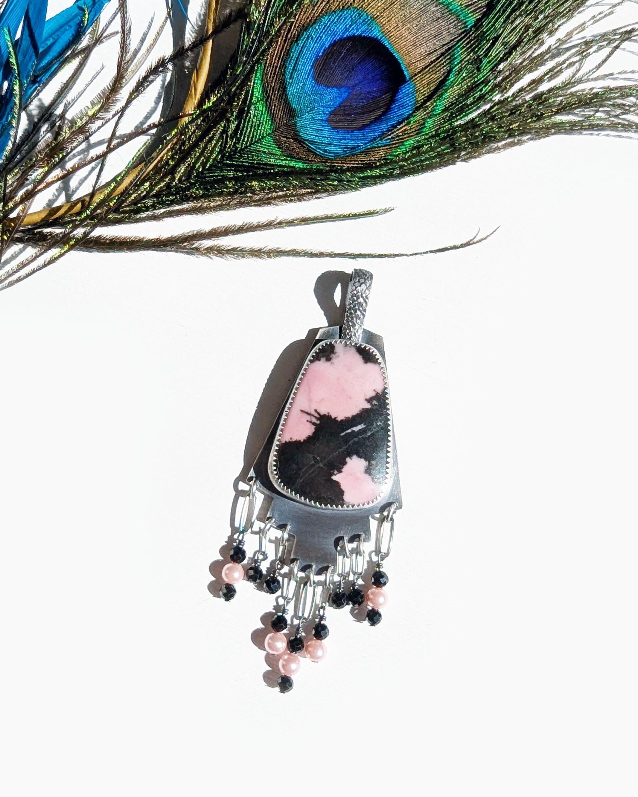 Artisan statement necklace featuring rhodonite and tourmaline