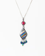 Recycled surfite artisan statement pendant shown on chain (not included)
