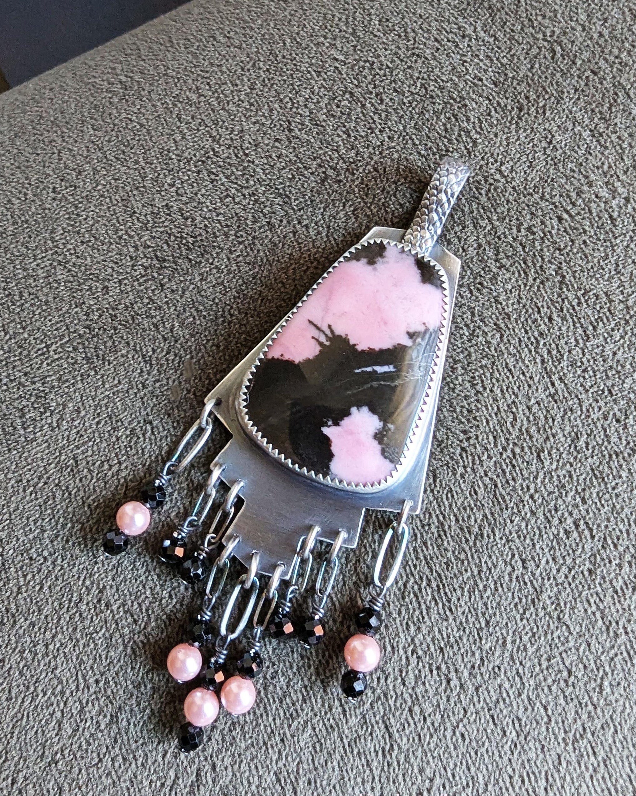Boho southwestern pendant with mystical pink and black contrast