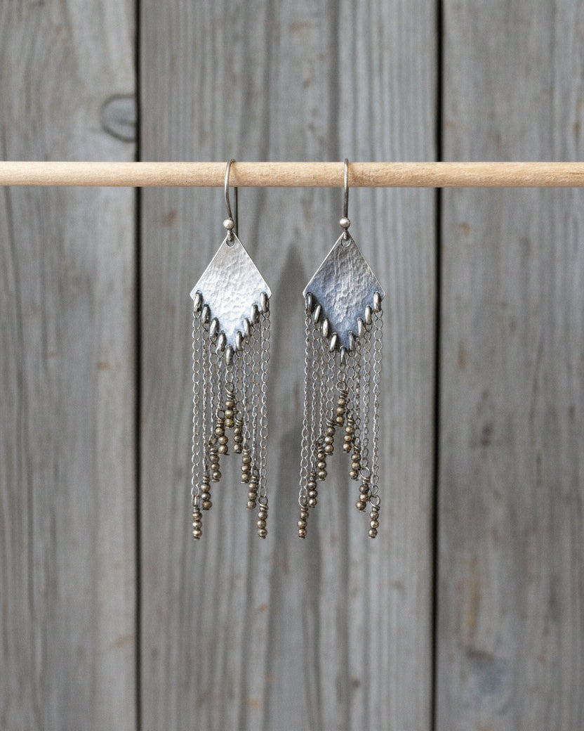 Hammered and oxidized sterling silver earrings with inverted metallic pyrite bead fringe
