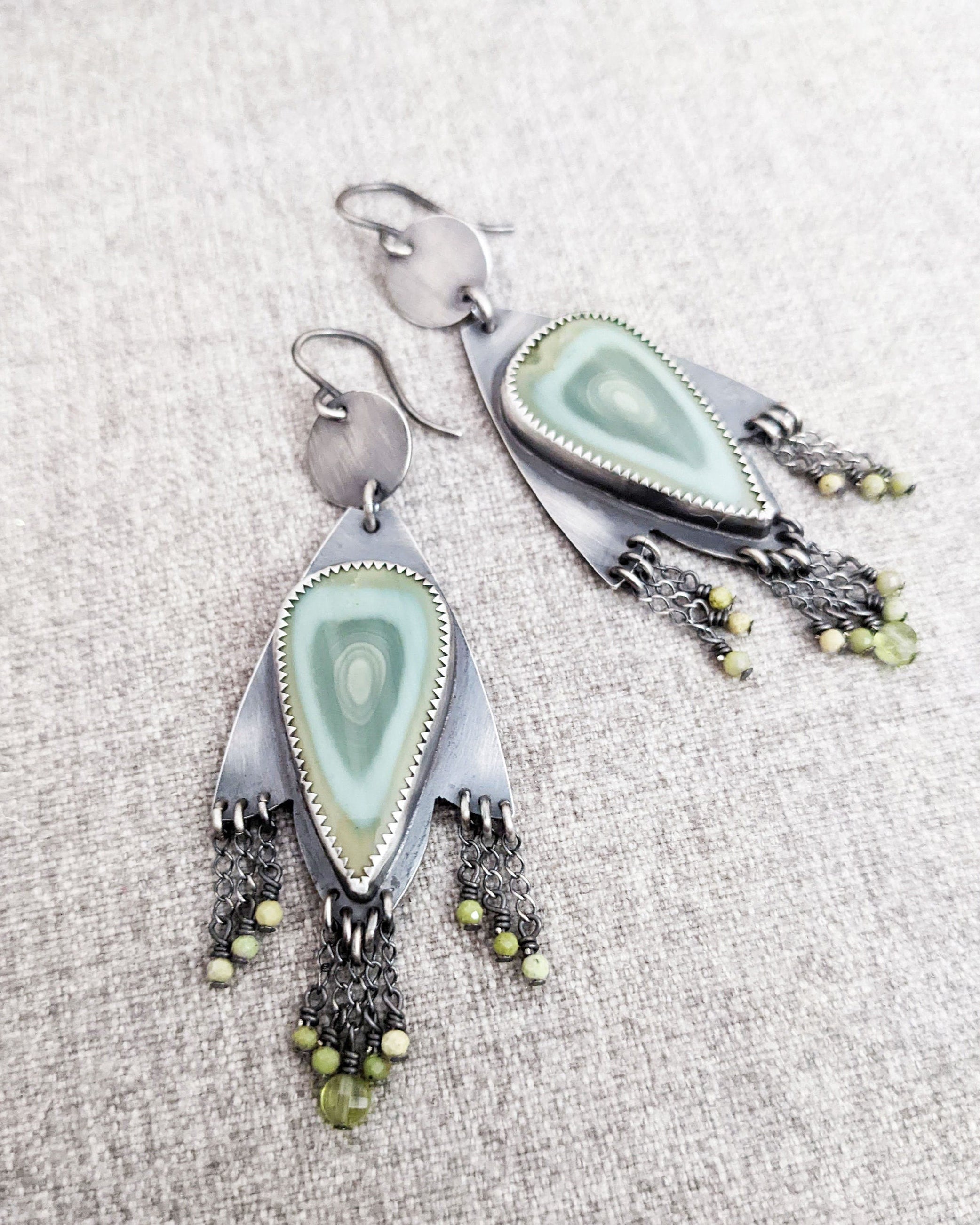 Boho fringe earrings featuring imperial jasper eye pattern and green gemstones
