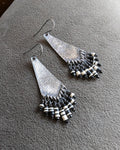 Arrow-shaped oxidized sterling silver earrings with hammered texture