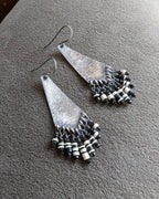 Arrow-shaped oxidized sterling silver earrings with hammered texture