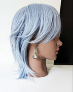 Bohemian grey moonstone earrings with timeless design on mannequin for scale