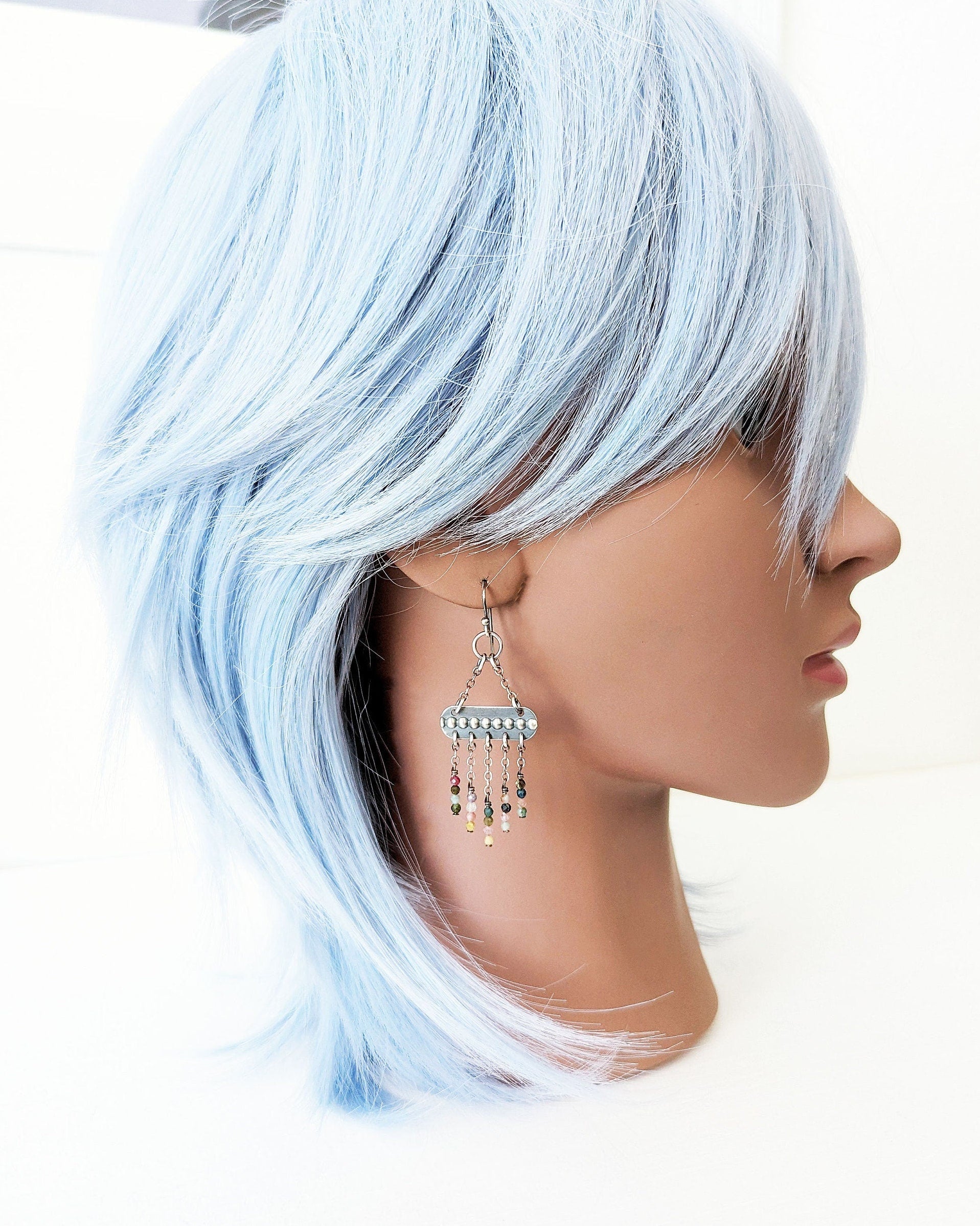 Artisan silver earrings with mixed tourmaline beads on mannequin for scale