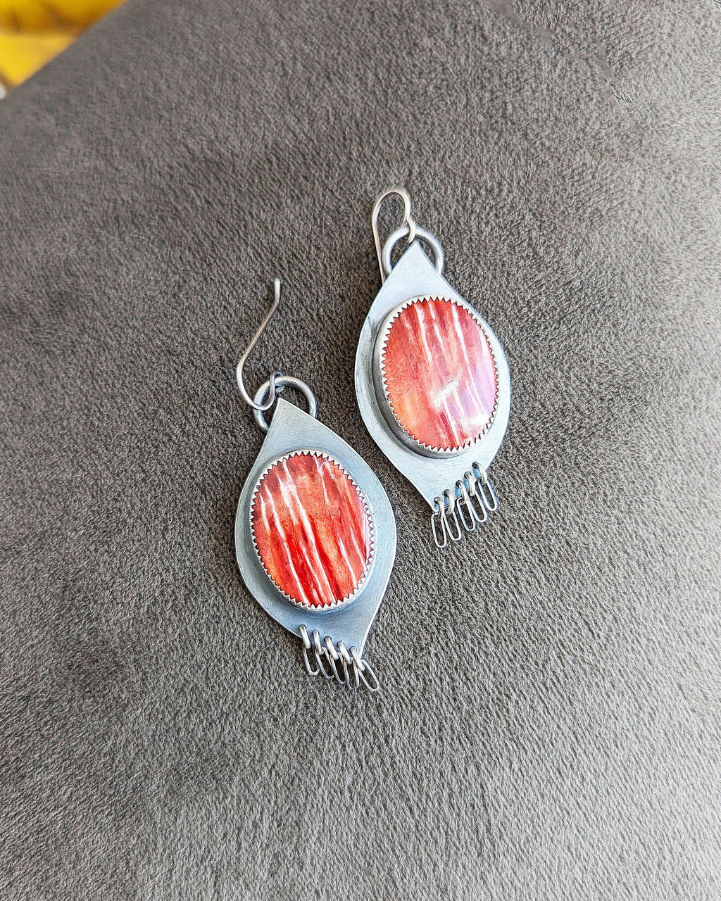 Natural shell statement earrings with warm sunset-inspired hues