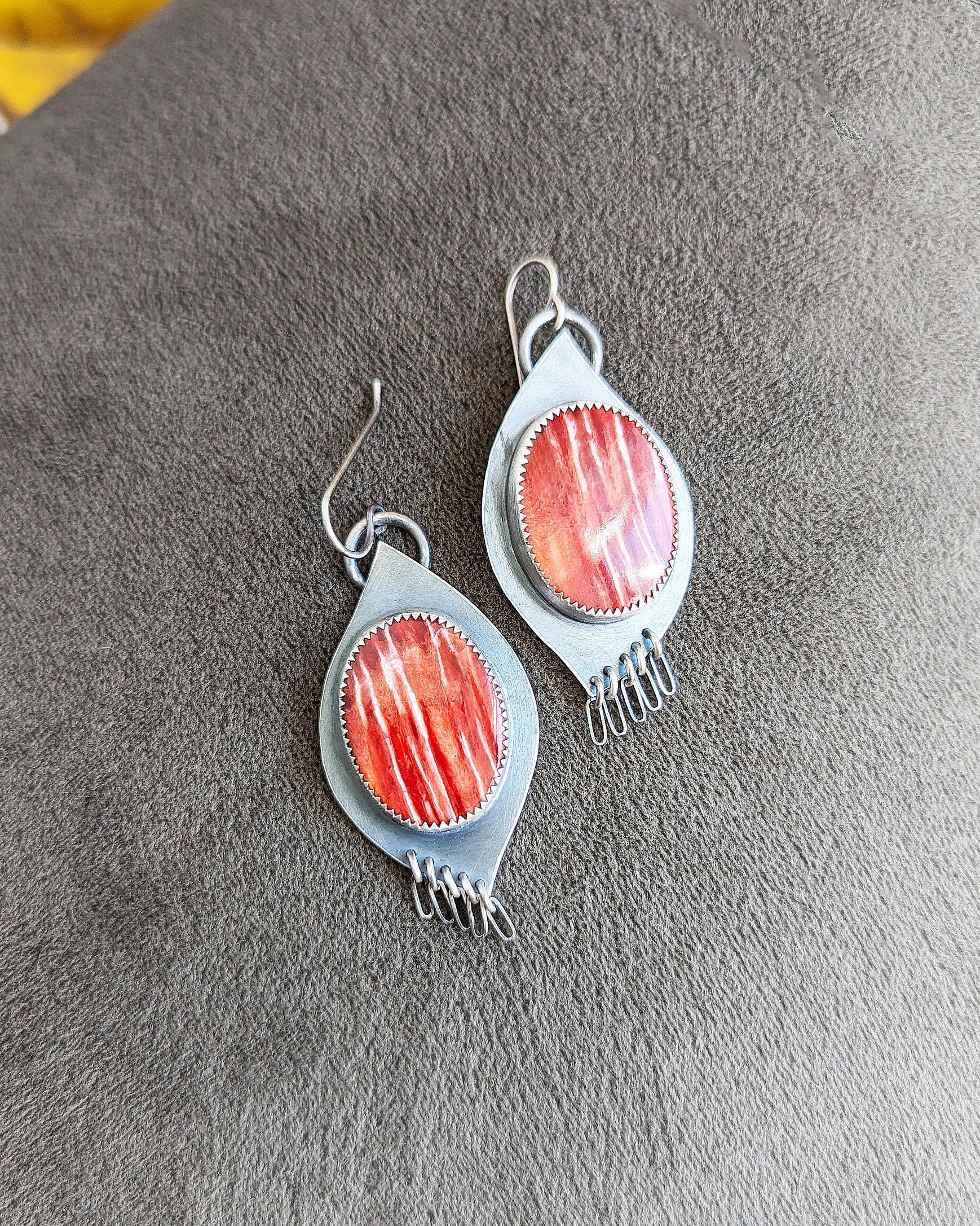 Natural shell statement earrings with warm sunset-inspired hues