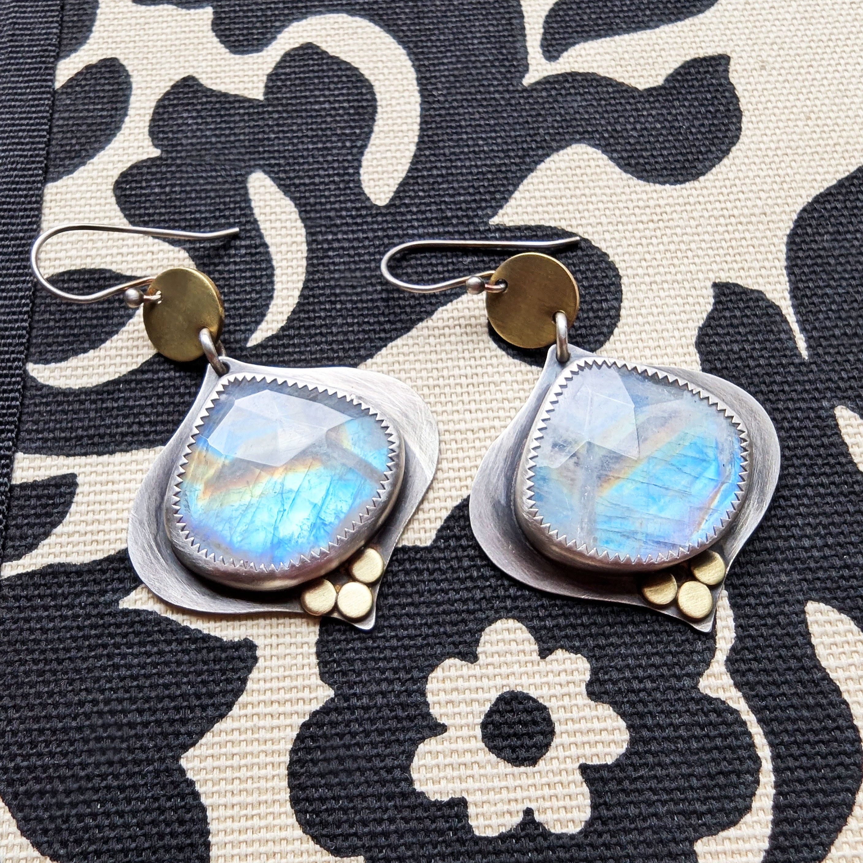 Rainbow moonstone mixed metal earrings by Rebellenhaus.