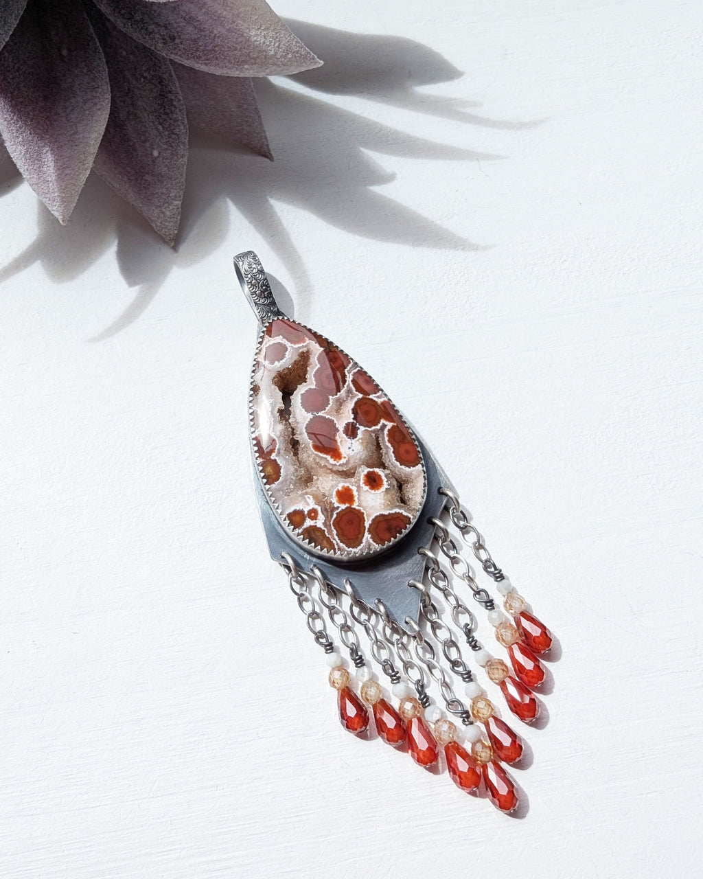 colorful jasper necklace with orange red and cream tones