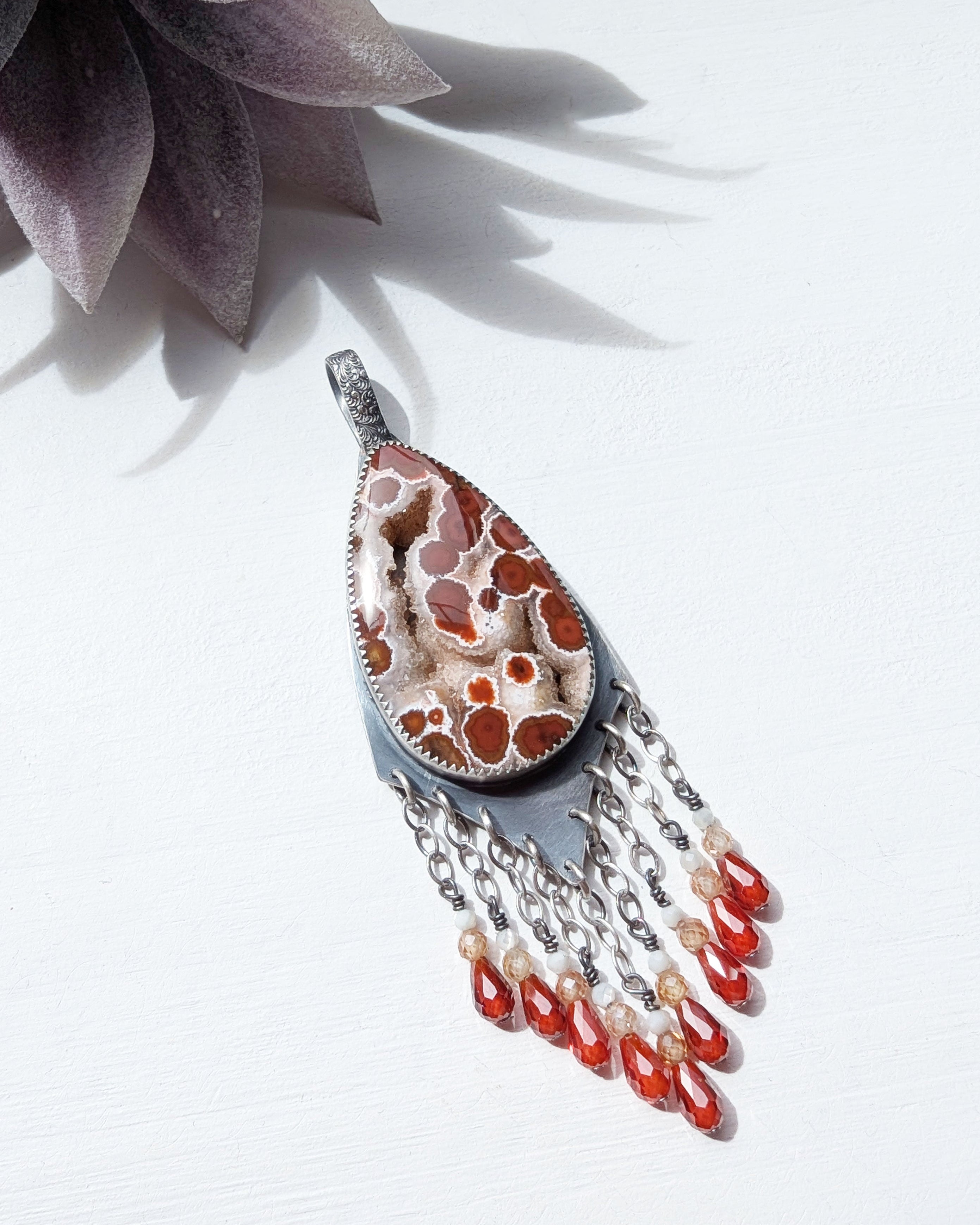 colorful jasper necklace with orange red and cream tones