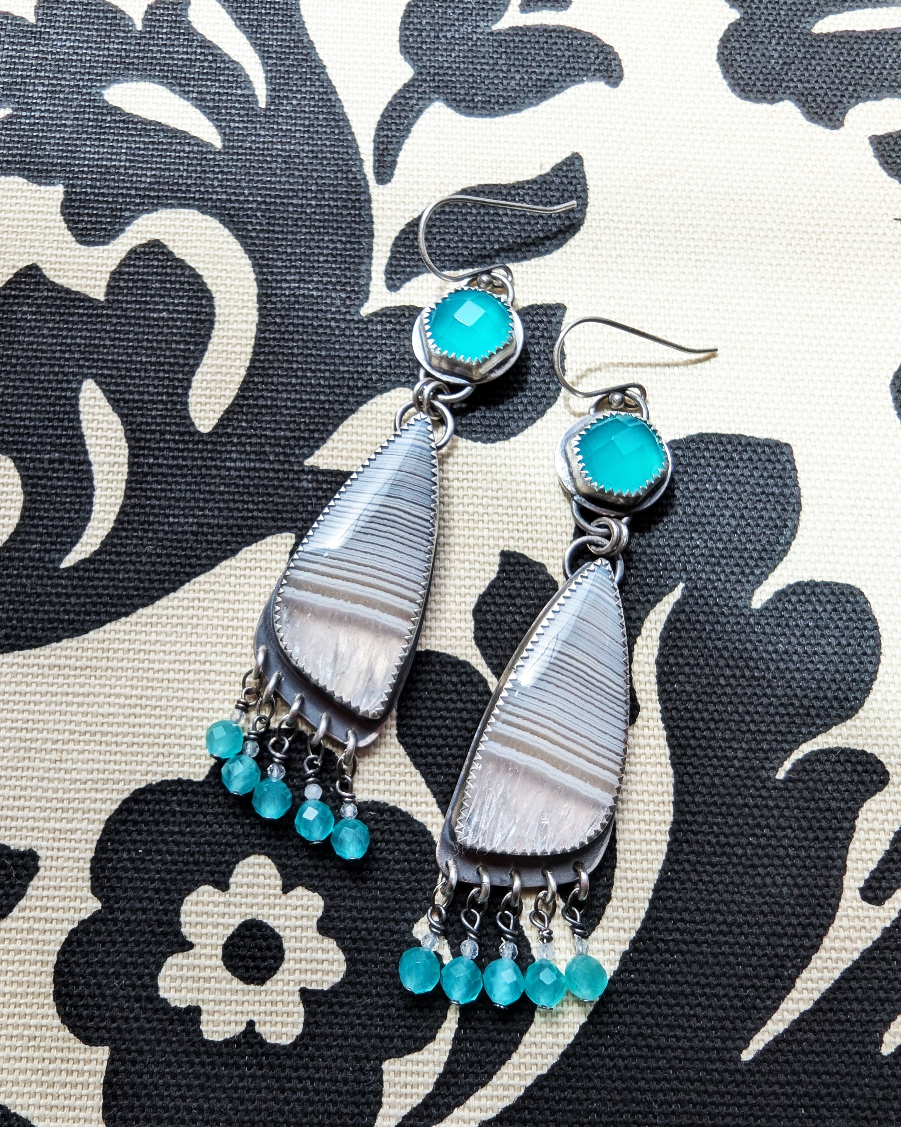 coastal inspired earrings with blue and white gemstones