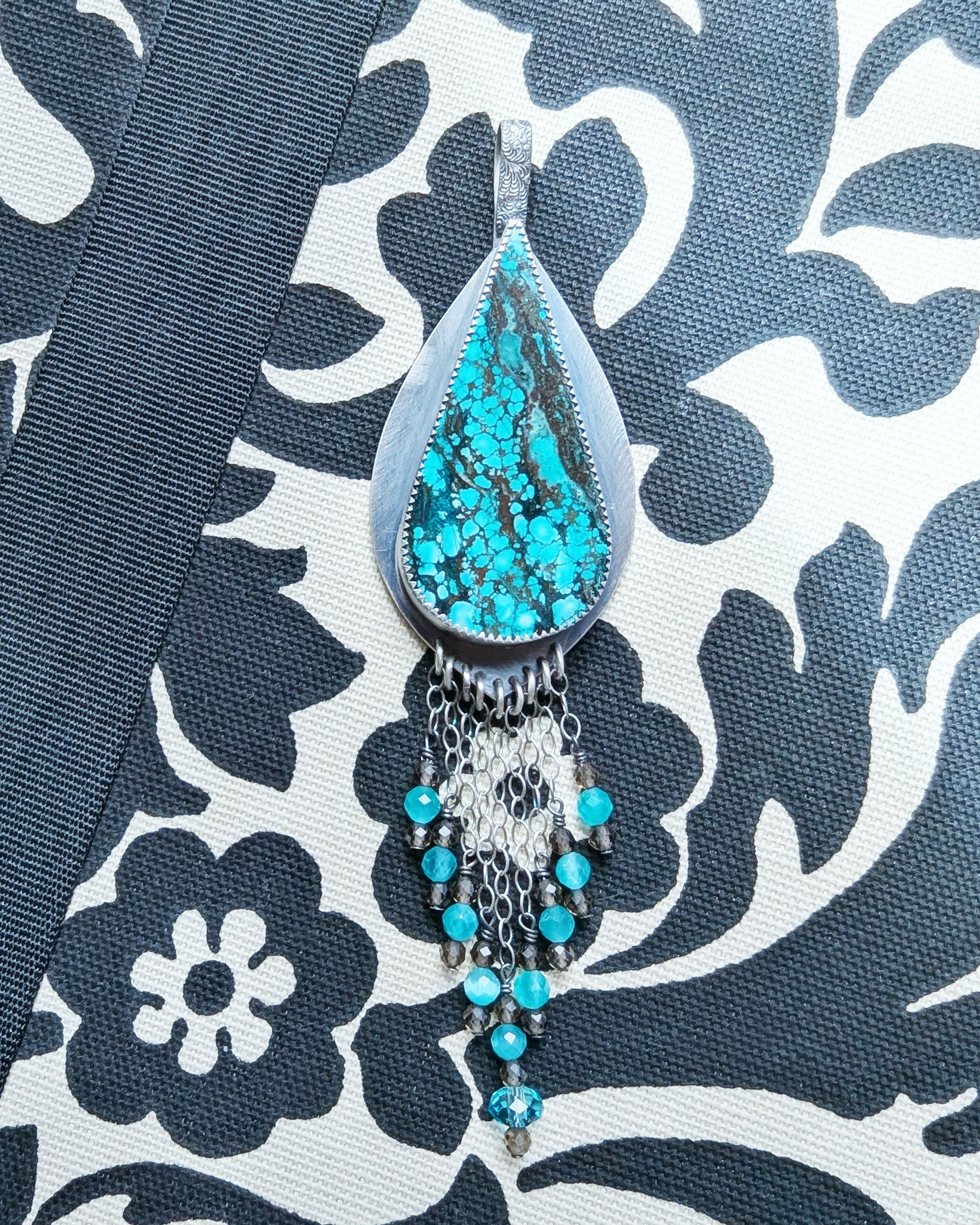 turquoise magnesite pendant with chocolate veining and fringe