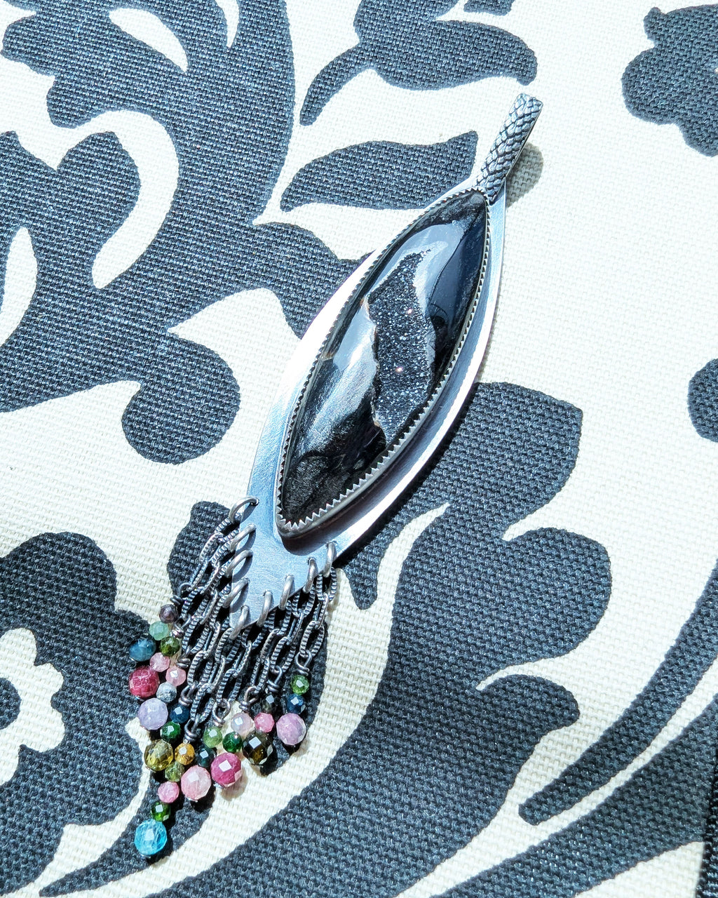 black agate druzy pendant with tourmaline fringe in oxidized silver