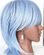artisan silver drop earrings with asymmetrical beaded fringe on mannequin for scale