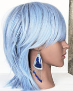 rose cut lapis lazuli earrings with cube bead fringe on mannequin for scale