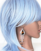 bold gemstone earrings with carnelian and black spinel beads on mannequin for scale