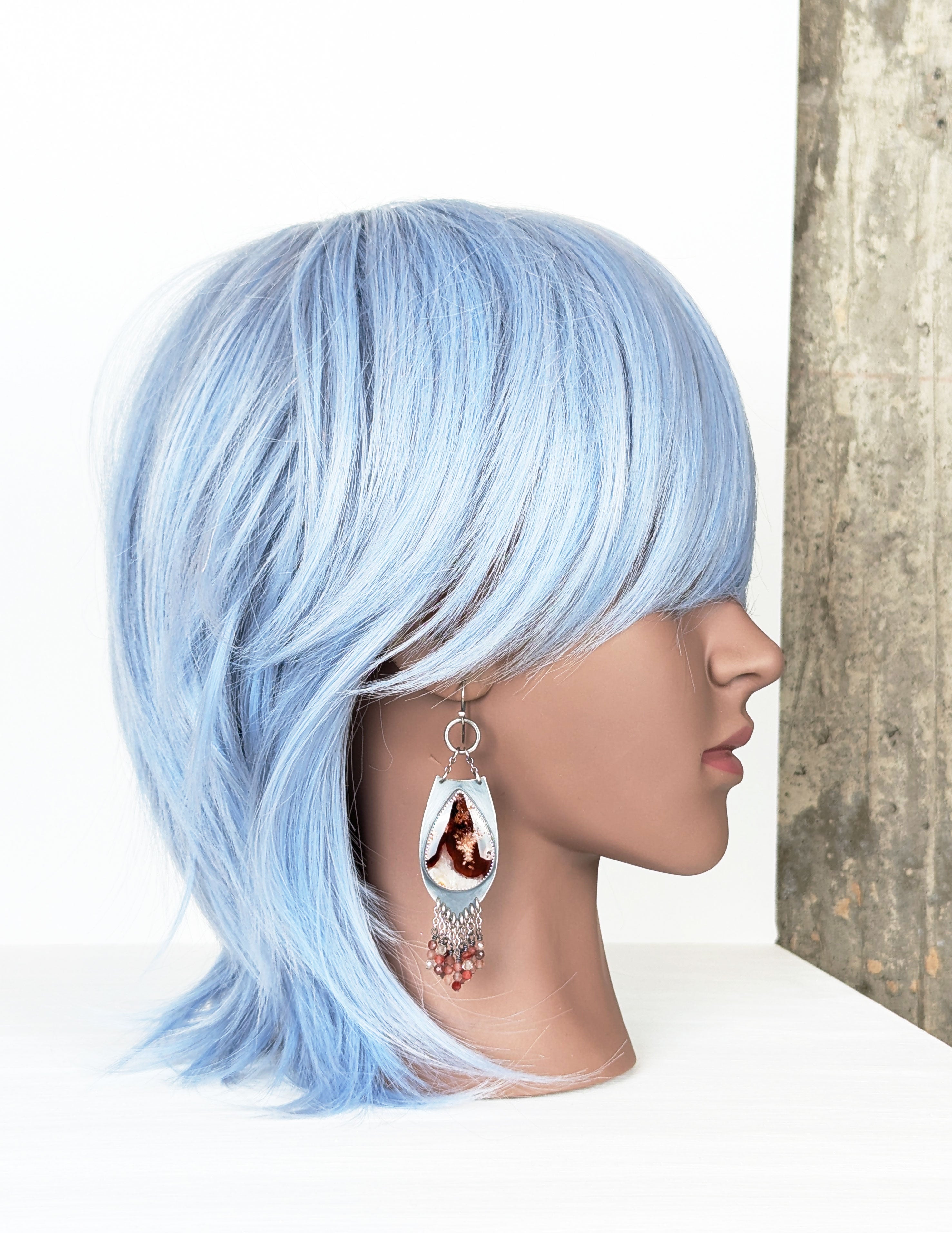 feminine artisan earrings with plume agate and beaded fringe on mannequin for scale