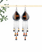 artisan silver earrings with dramatic v shaped chain fringe