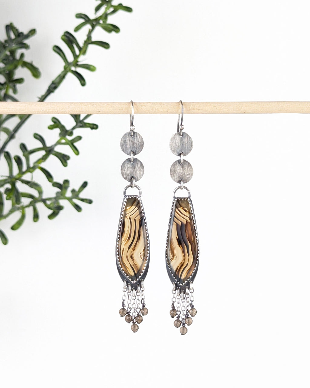 luxury boho earrings with oxidized silver coin design