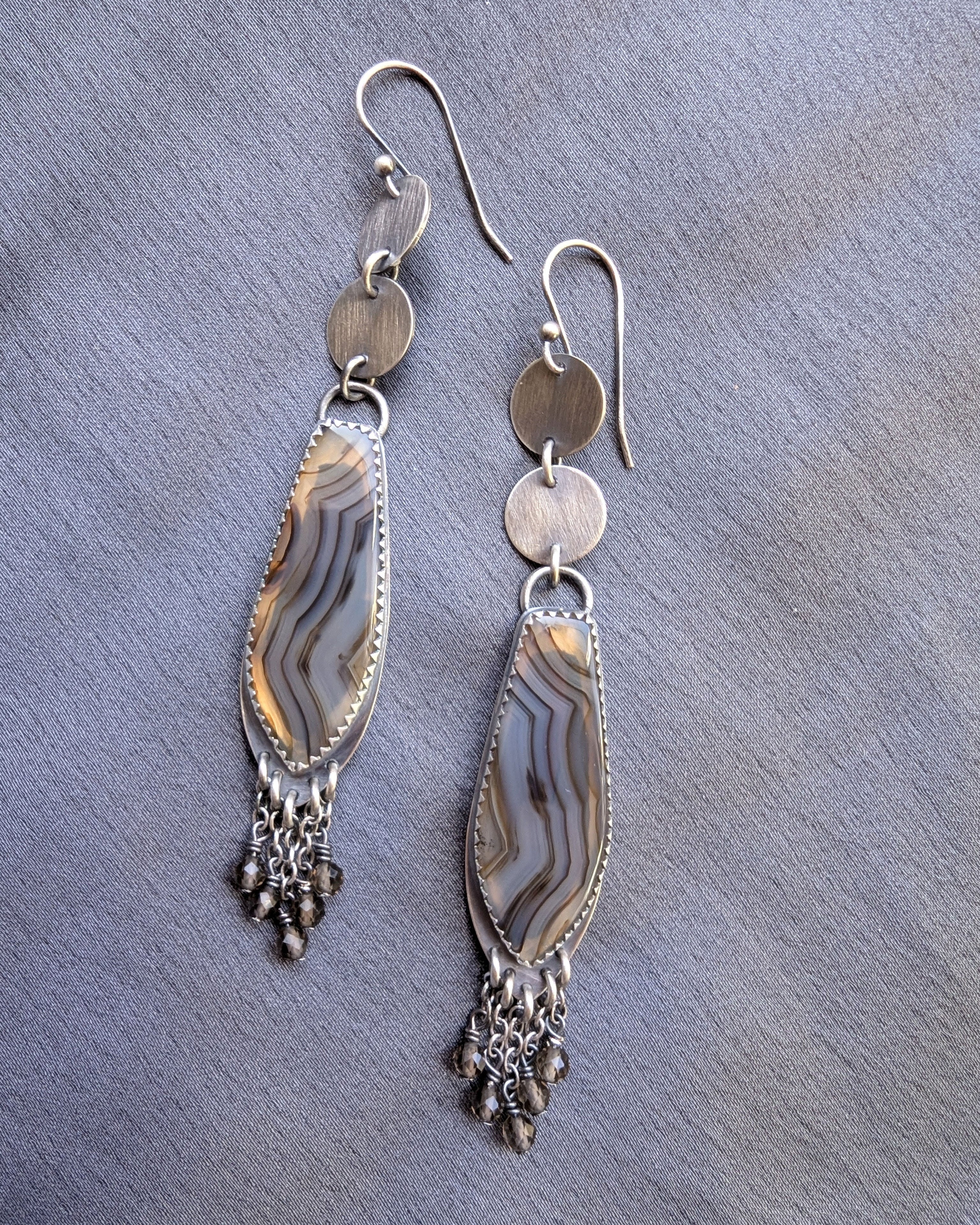 backless Montana agate earrings showing natural stone striations