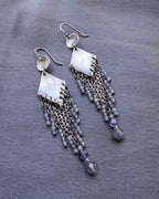 elegant fringe earrings with violet gemstones and silver design