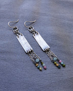 subtle statement earrings with rectangular silver and bead fringe