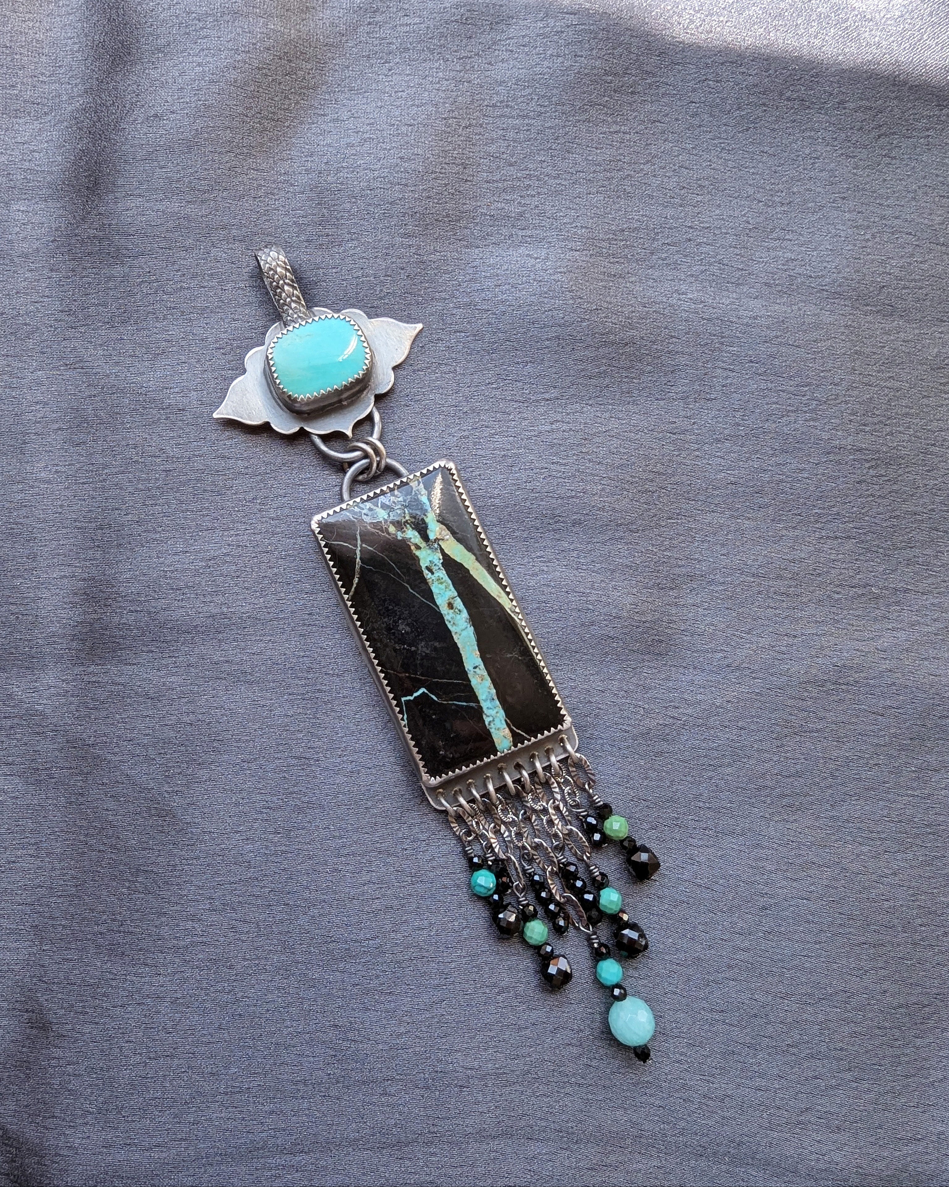 artisan turquoise pendant with blue green stones and bead fringe