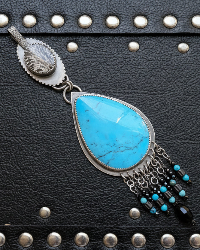 large blue turquoise pendant with oxidized silver and fringe