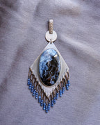 bold gemstone pendant with navy and electric blue tones