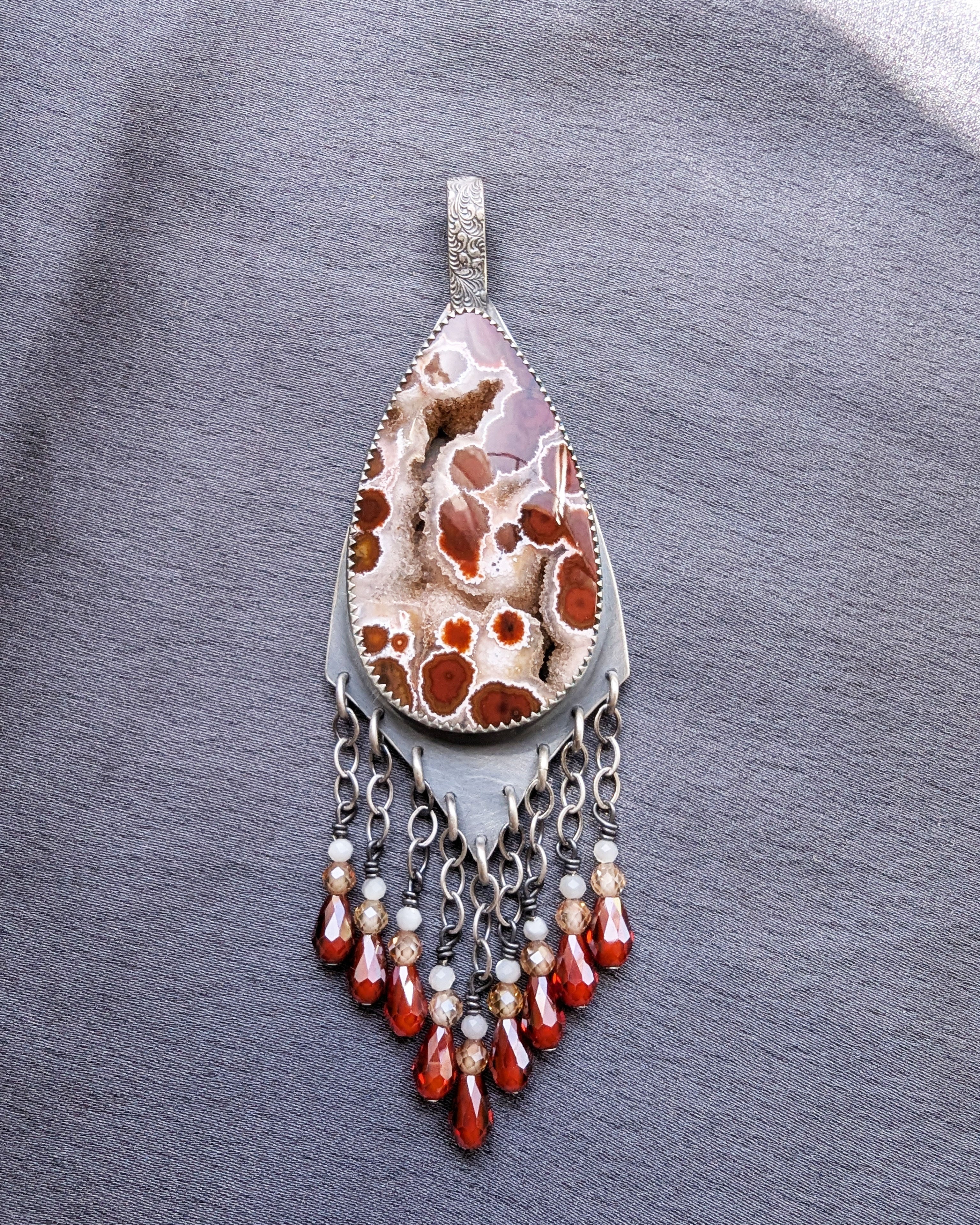 bold statement pendant with druzy jasper and warm colors
