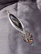 handcrafted oxidized silver pendant with tourmaline accents
