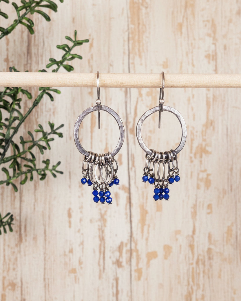 handcrafted sterling silver hoop earrings with bright blue lapis accents