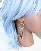 artisan brass hoop earrings with sparkling crystal movement