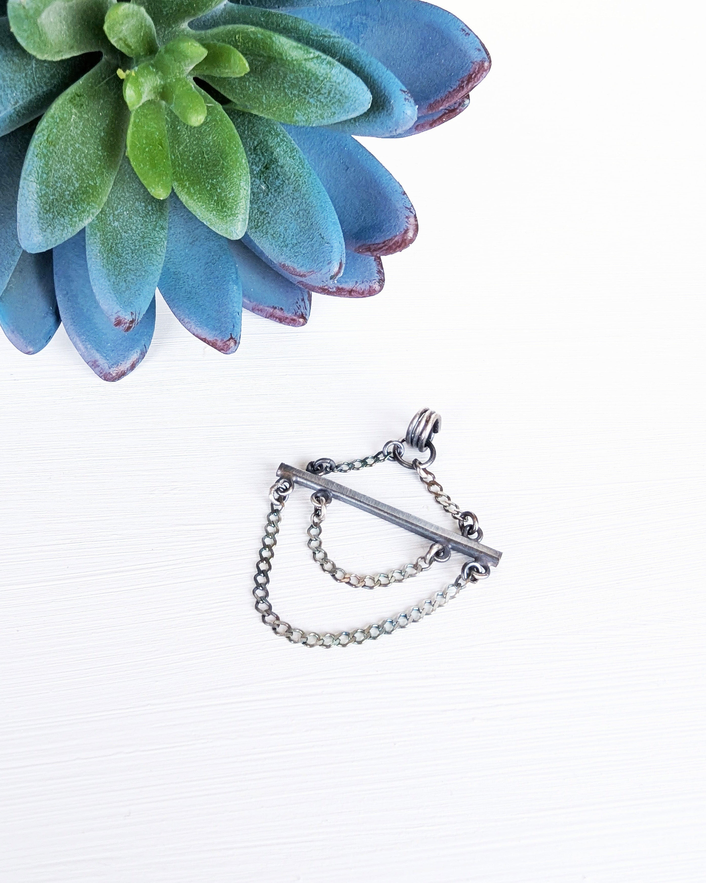 modern oxidized sterling silver pendant with double chain swags