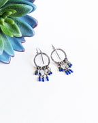 lightweight oxidized silver earrings with hammered hoops and gemstone details